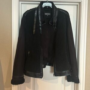 Moto jacket with faux leather details.
